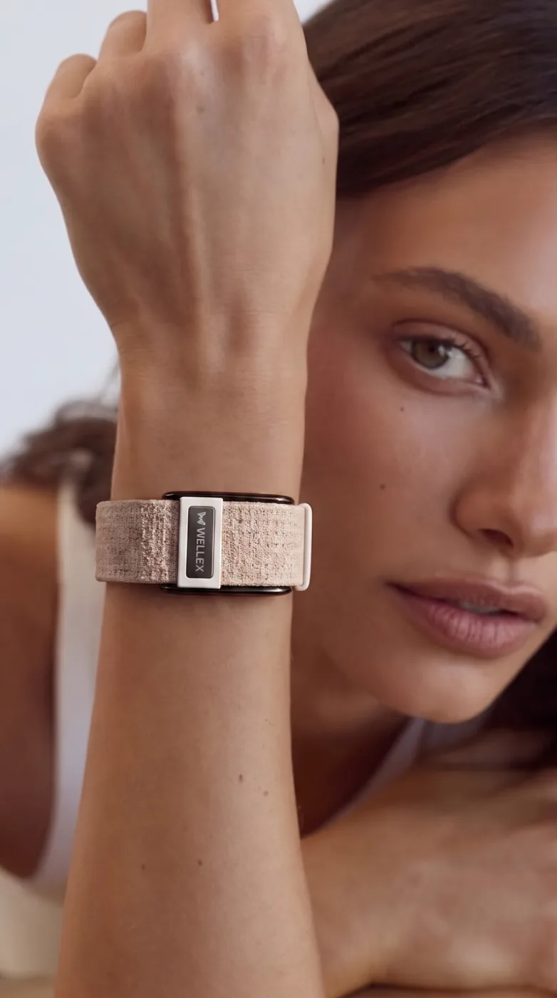A person with the band on the wrist, hand resting near the face