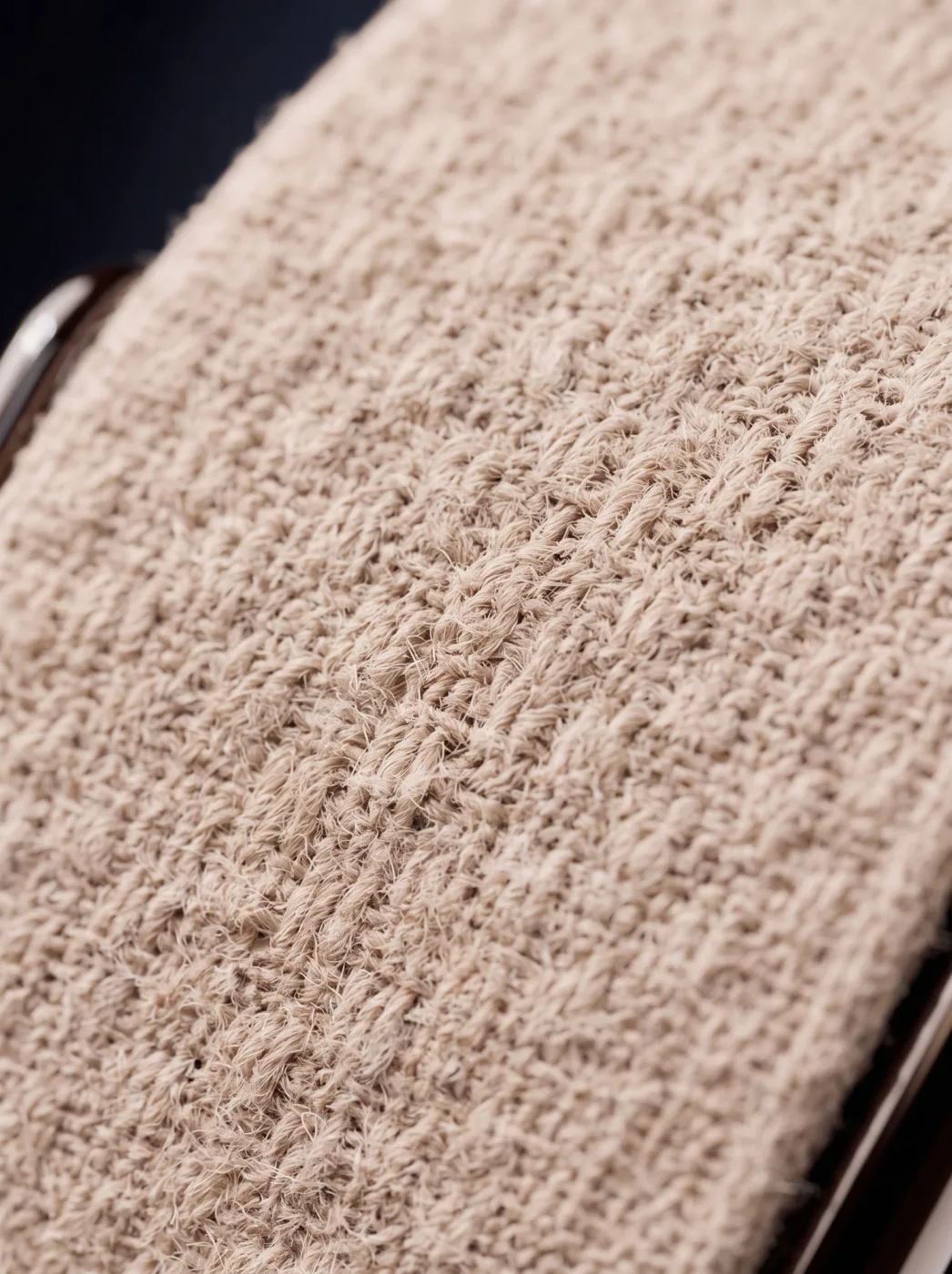 The woven strap in close view — the whole surface of the product, with nothing to look at